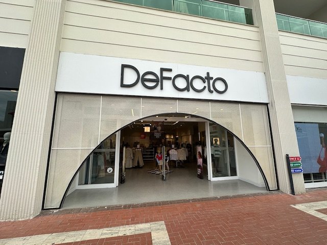 Defacto